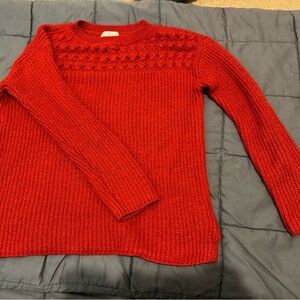 Red sweater with sparkles